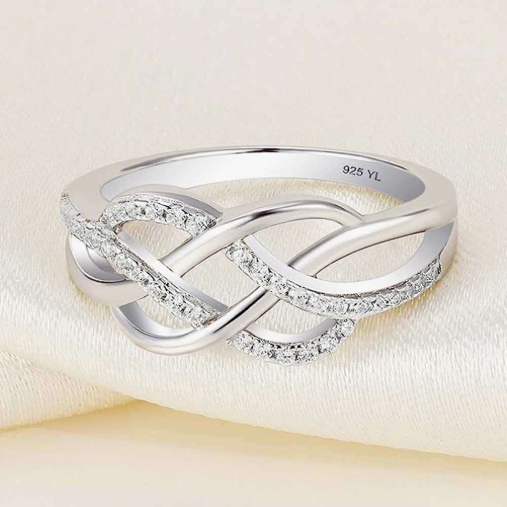Sterling Silver White Infinity Twist Ring with Pavé Stones